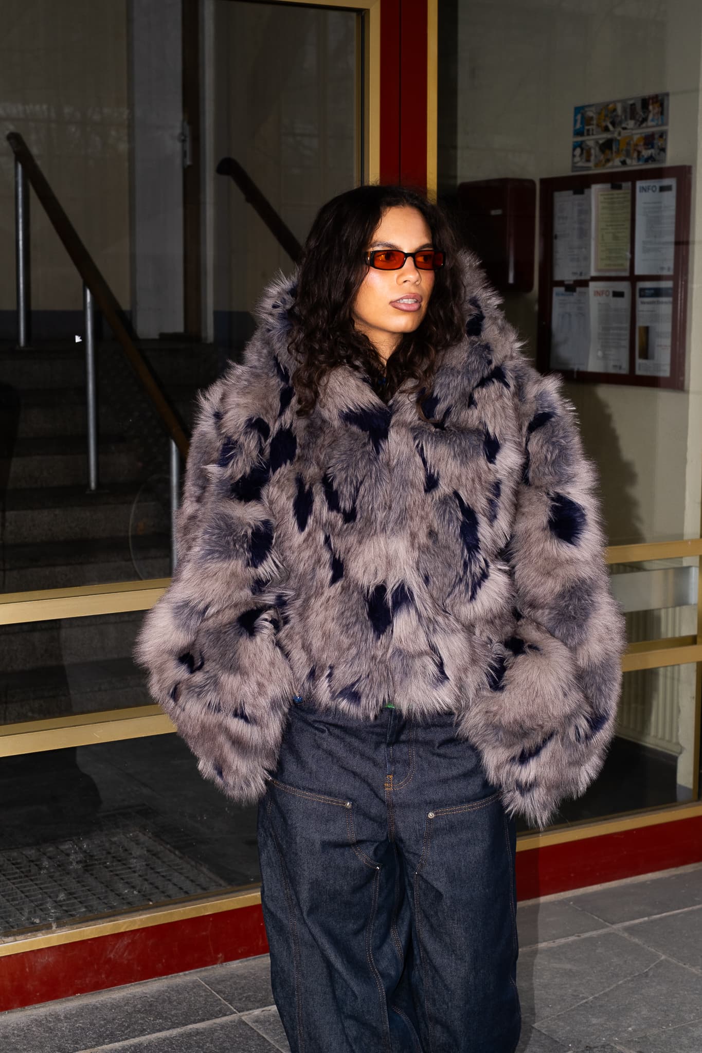 MARÍAJOSÉ in fur coat at the red doors of WBM